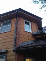 Водосточная система Металл Профиль на доме с металлочерепицей
