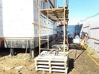 Боковой вид завершённого фасада Woodstock