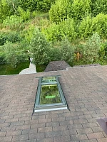 Fakro FGH-V P2 Galeria 78x255 на кровле из гибкой черепицы, вид сверху