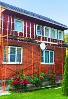 Монтаж фасадных панелей Docke Flemish на леса, крыша Металл Профиль